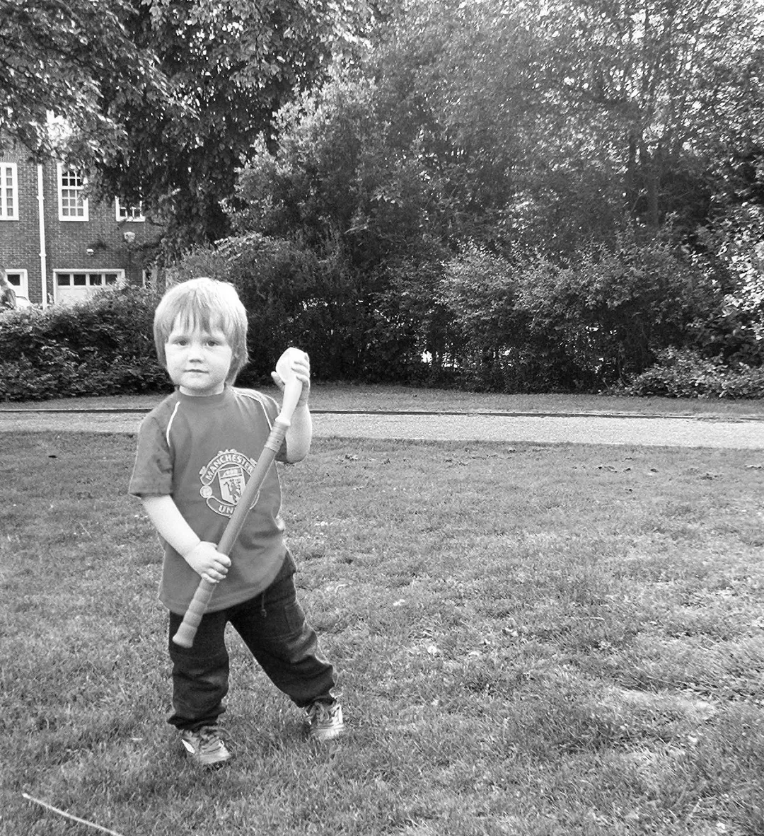 Bård with a plastic golf club